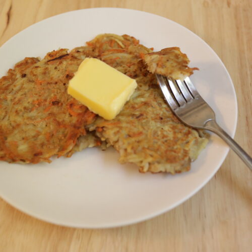 potato pancakes with a pat of butter